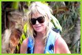 Goldie Hawn Rocks a Red Swimsuit at Age 67, Feeds Dolphins With Kurt Russell